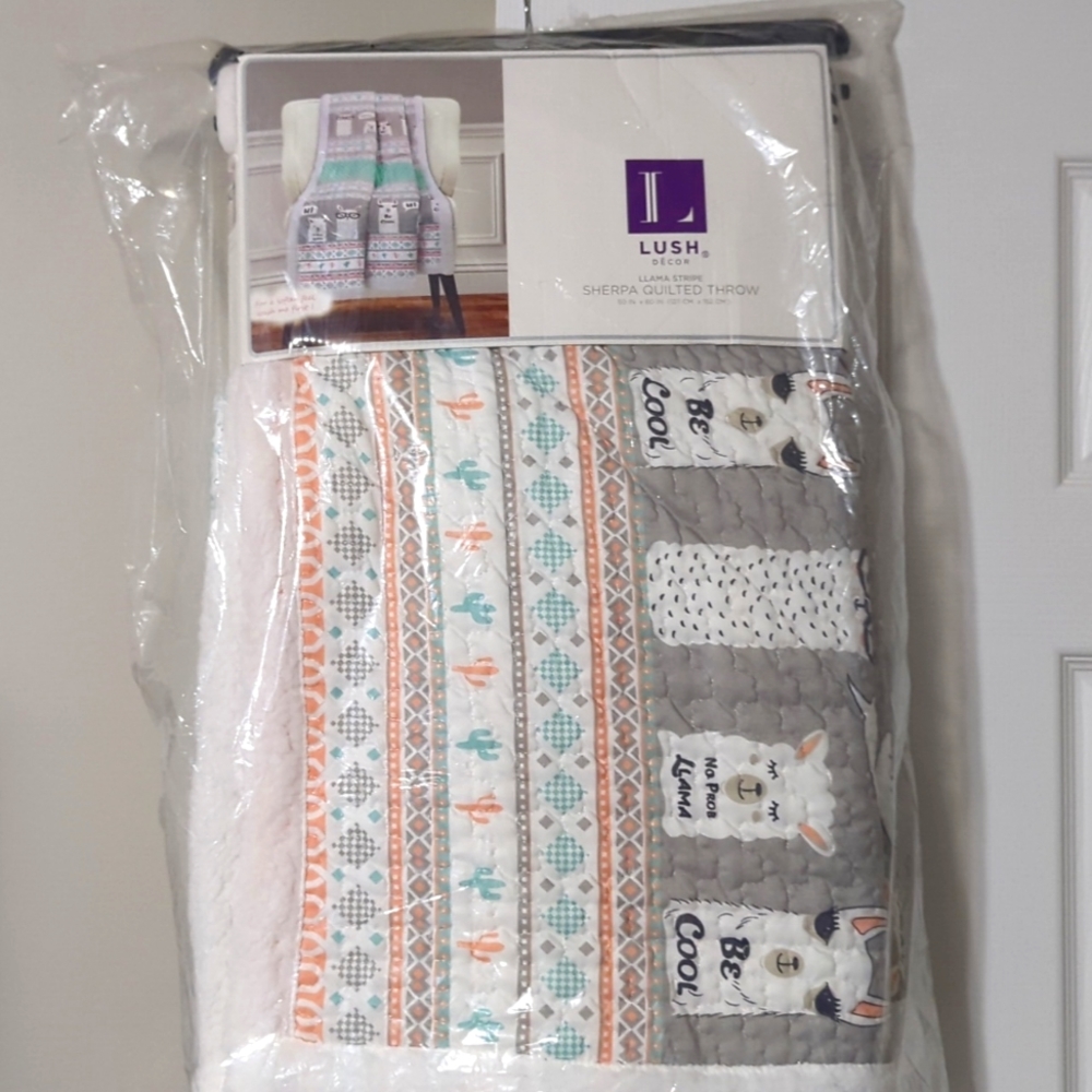 Brand new Llama stripe Sherpa quilted throw